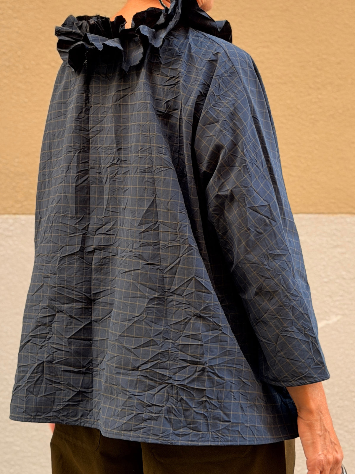 Camisa de quadres — coll de volants