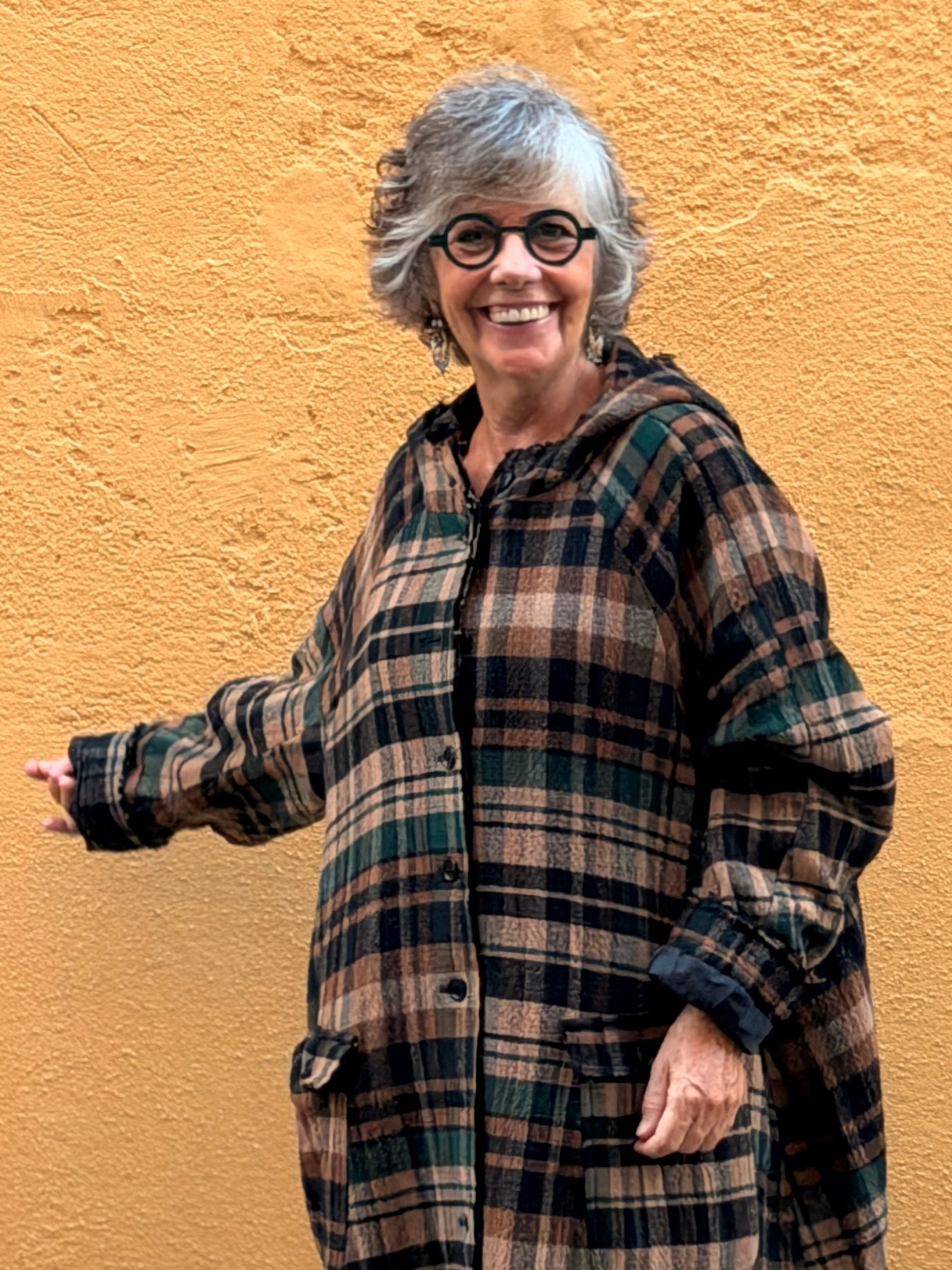Abric de quadres — caputxa i línia evasé