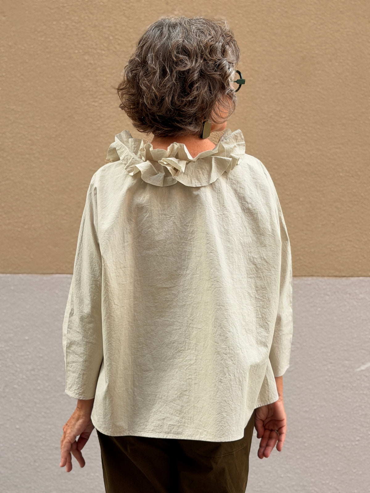 Camisa oversize — coll de volants