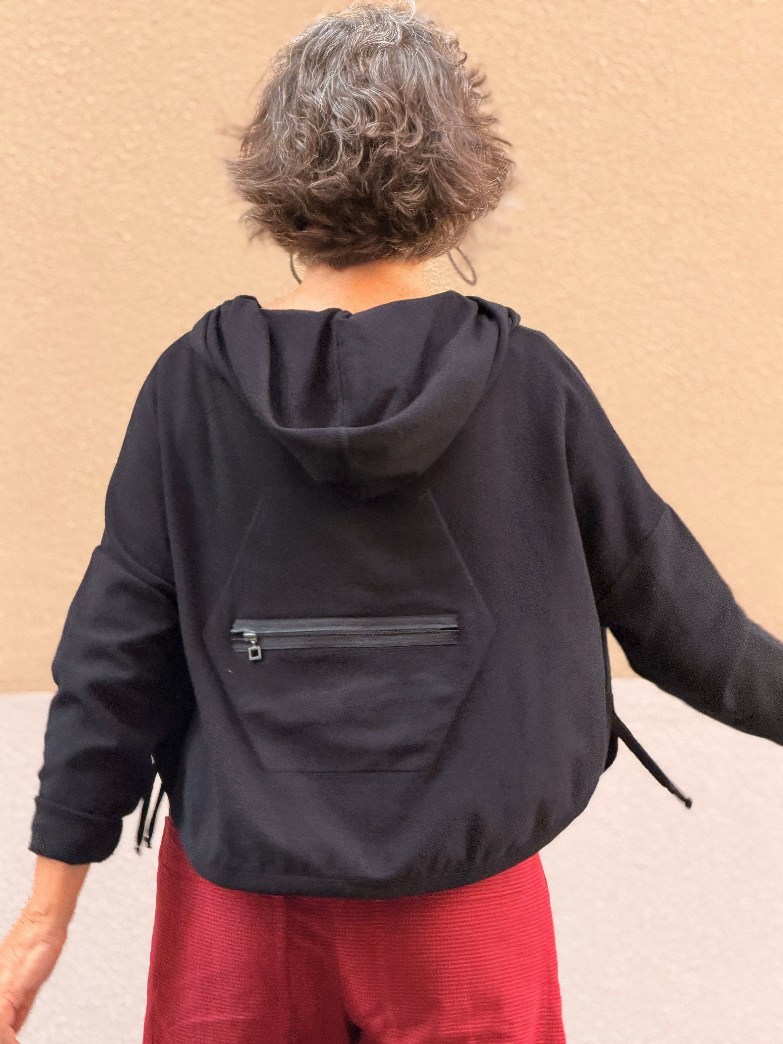 Jaqueta de punt fi — caputxa i doble cursor