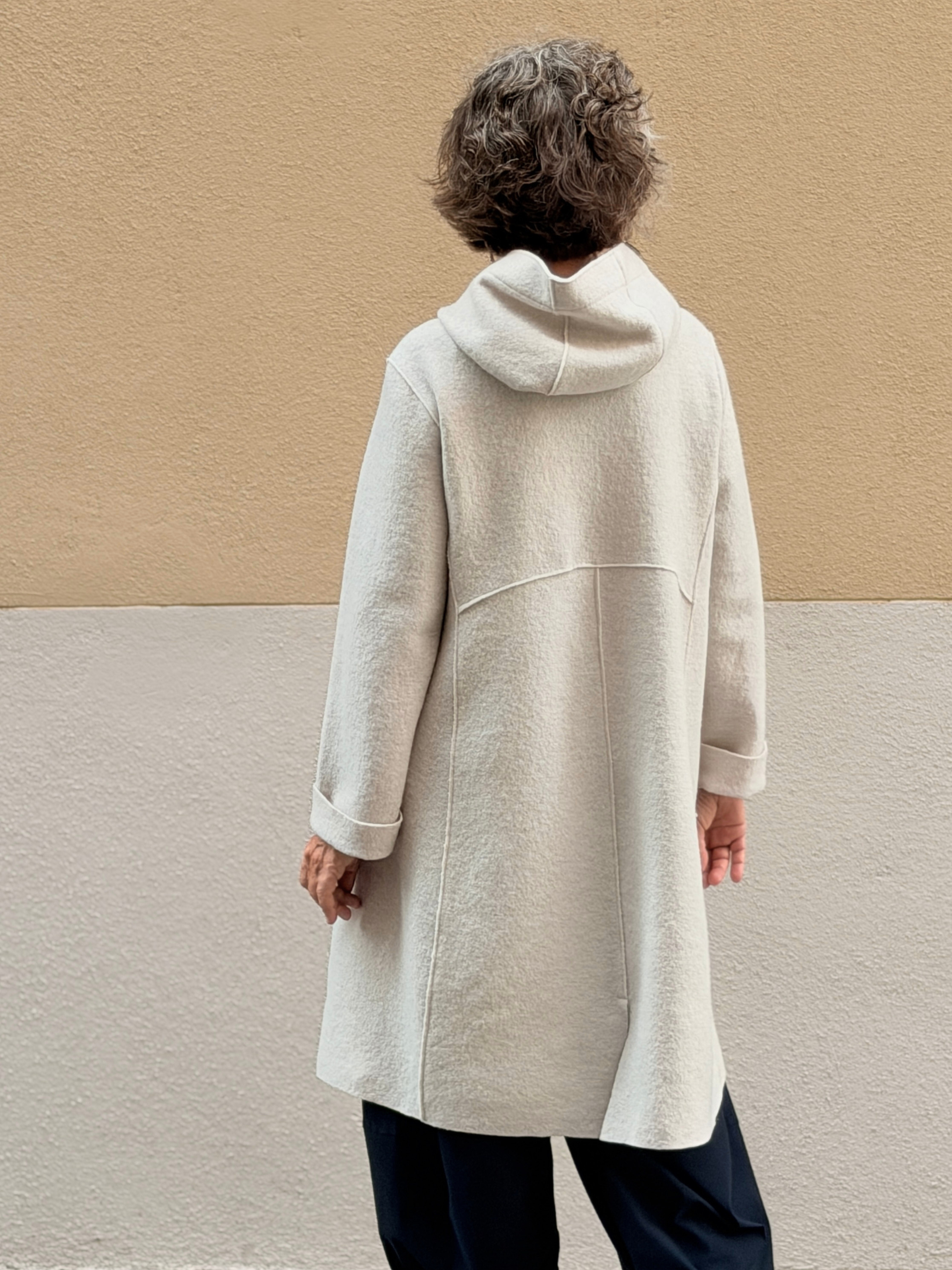 Abric de llana bullida — caputxa