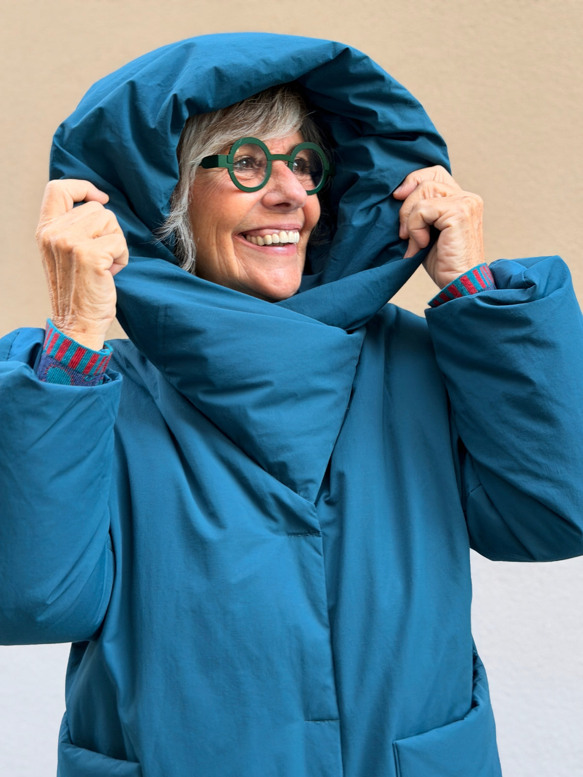 Down coat — hood and water-repellent