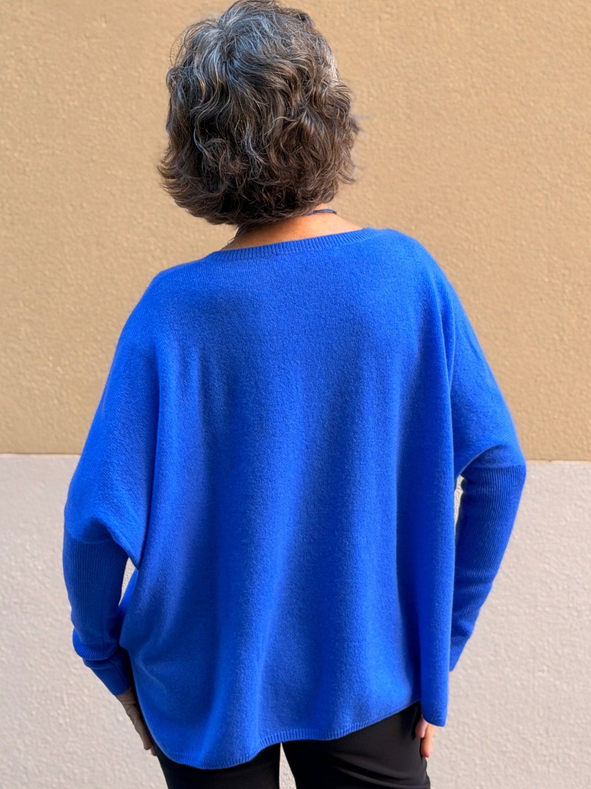 Jersei de caixmir — escot en V i tall ample
